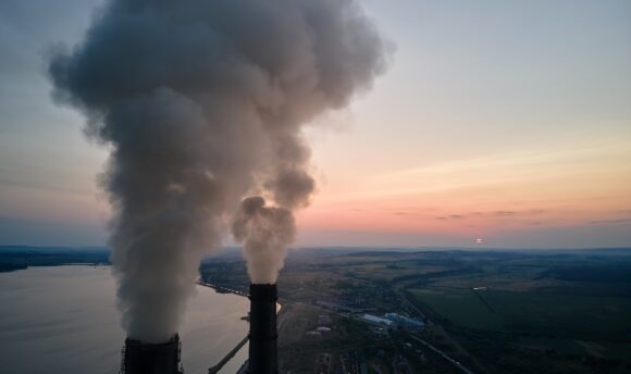 aerial view of coal power plant high pipes