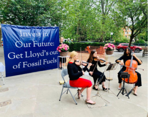 Mother's Rise Up stringed trio protest outside the Association of Lloyd's Members AGM